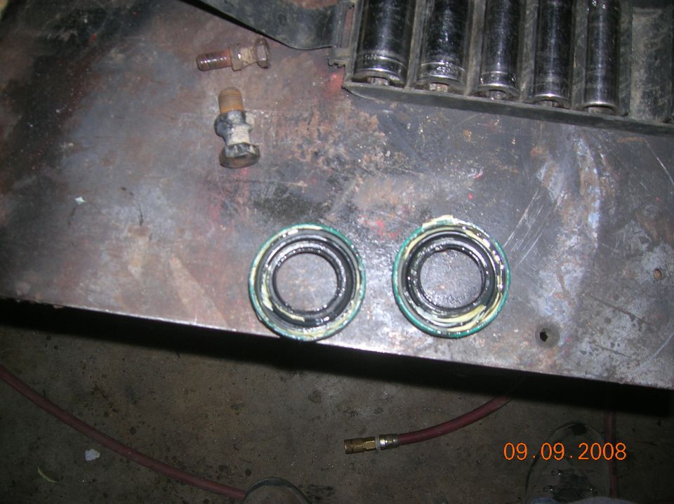 inner seals, you can see the one on the left is oblonged, most likely the reason for the oil leaking out of the passenger axle tube.