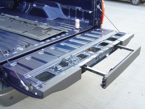 2008 Ford F-250 - Tailgate of a 2008 Ford F-250 pickup truck, showing the step mechanism.