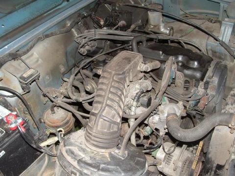2001 Ford F-350 - Engine bay details showing various mechanical parts and wiring harnesses.