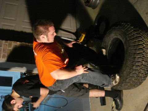 1996 Ford Bronco - What do you do when you cant get the HDPE insert out of your tire?? Get a buddy that dead lifts 450lb.