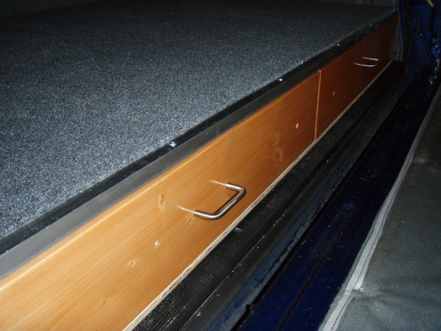 Another view.  I haven't desided what to do about the bottom edge.  I'll probably go back to Home Depot and get another aluminum strip, like on the top.  But at 10 bucks each, I'll hold off for now.