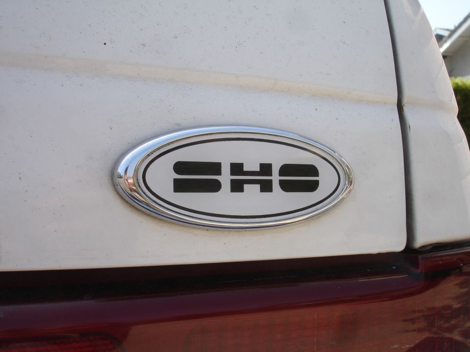 SHO badge on white car