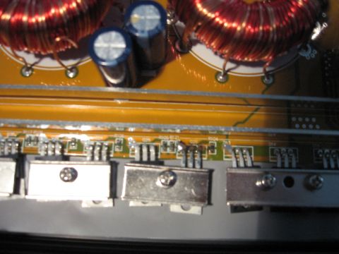 1992 Ford Crown Victoria - This image shows an electronic circuit board with various components, including capacitors and transistors, and a watermark for-sale websit…