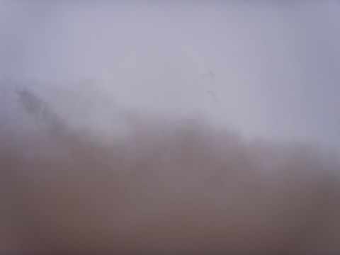 1978 Ford Bronco - A severe dust storm reduces visibility to near zero, creating a hazy, monochromatic scene.