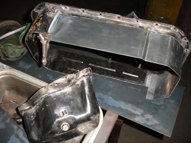 New oil pan....2 1/2 gallons....and deep rear sump