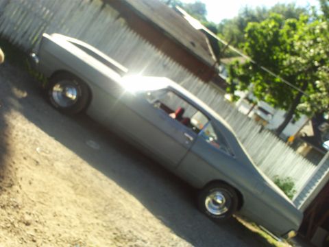 1967 Ford Galaxie - This 1967 Ford Galaxie is seen from a 3q-front angle, appearing to be in a residential area.