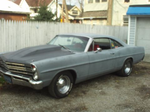 1967 Ford Galaxie - A gray 1967 Ford Galaxie with a custom hood scoop is parked in a driveway.