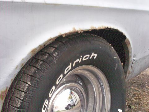 1967 Ford Galaxie - Rust damage is visible around the rear wheel well of this vehicle.