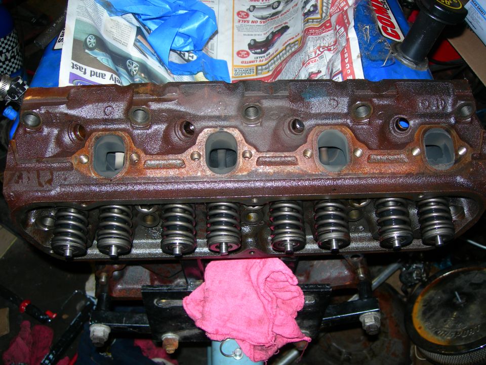 Rusted engine cylinder head with valve springs and ports