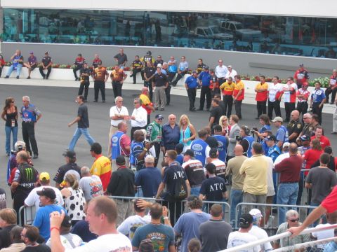 1992 Ford Mustang - A large group of people are assembled at what appears to be a racing event.