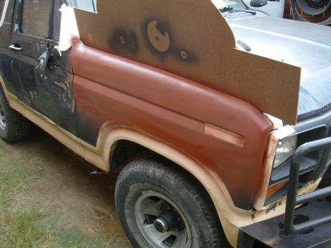 1983 Ford Bronco - Using state-of-the-art masking & paint booth technology, I put a few light coats of primer on.