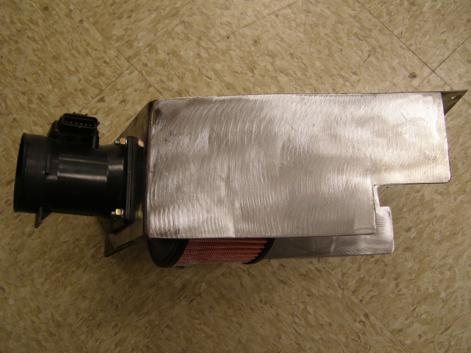 Custom aluminum intake box with mass airflow sensor and red cone filter