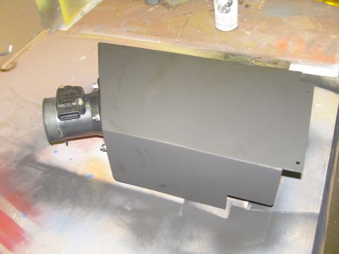 2003 Ford Crown Victoria - A gray metal air intake box with a black sensor attached is shown on a work surface. The air intake box appears to be a custom modification.