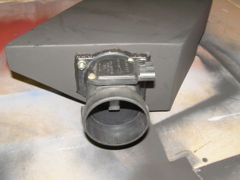 2003 Ford Crown Victoria - A custom-painted gray air intake box is shown with a mass airflow sensor attached. The sensor is bolted to the box and sealed with black si…