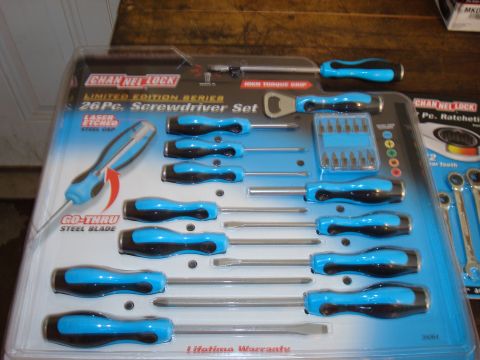 1992 Ford Bronco - A set of screwdrivers with blue and black handles is displayed in its packaging.
