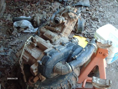 1990 Ford F-150 - This image shows an ATV engine and drivetrain assembly, not a 1990 Ford F-150.