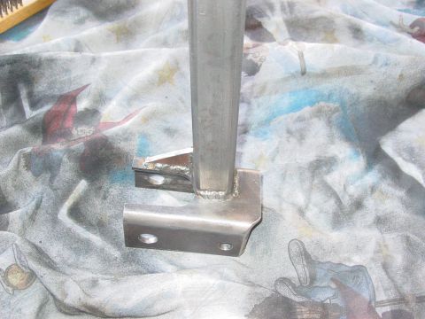 1979 Ford Bronco - A close-up view of a custom-fabricated metal suspension component, likely for off-road or performance modification.