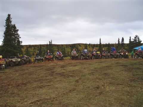 2000 Ford E350 - Group of ATVs gathered in an outdoor setting, likely for an off-road excursion.