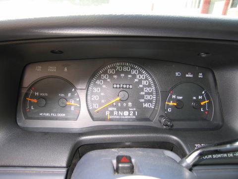 2001 Ford Crown Victoria - Interior view of the dashboard gauges for a 2001 Ford Crown Victoria, with an odometer reading of 57,926 miles.