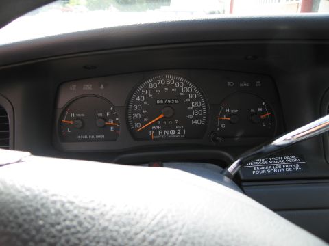 2001 Ford Crown Victoria - Interior view of a 2001 Ford Crown Victoria dashboard, showing the instrument cluster and gear shifter.