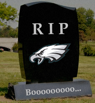 1988 Ford Bronco - A black tombstone with "RIP" and an eagle logo is in a grassy cemetery. The base of the tombstone has "Booooooo..." written on it.