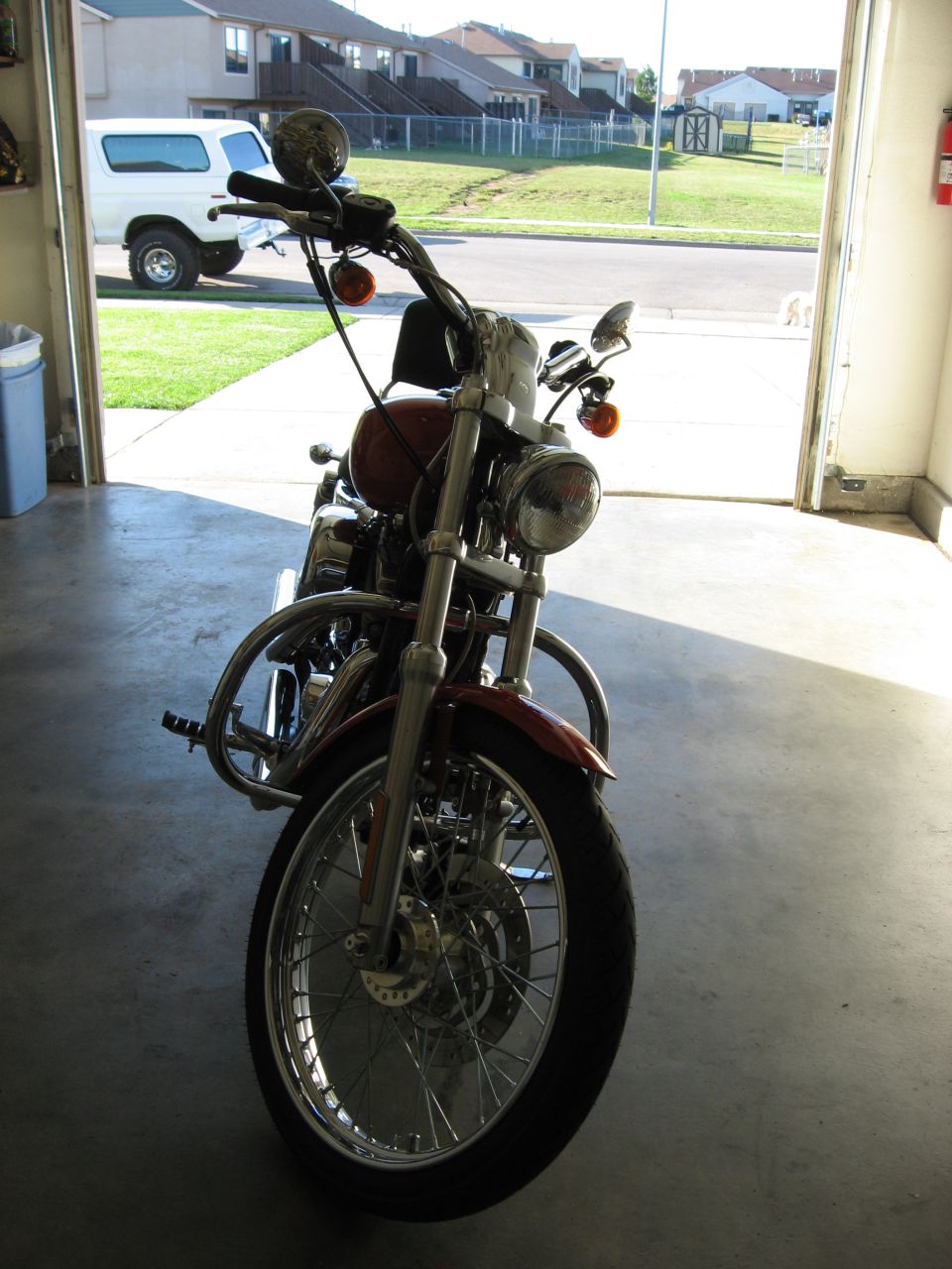 2004 Harley-Davidson Sportster Custom motorcycle parked in a garage.