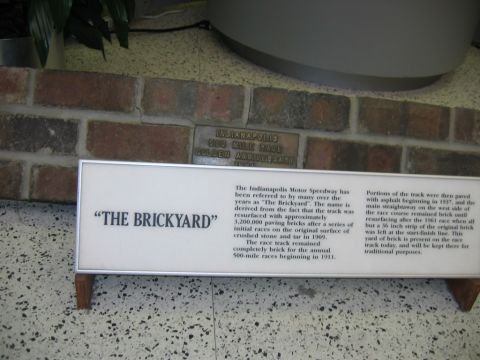 1985 Ford LTD Crown Victoria - Photo of an Indianapolis Motor Speedway museum signage placard, not a technical document.