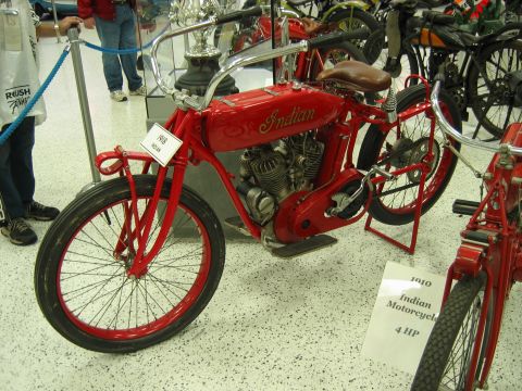 1985 Ford LTD Crown Victoria - Museum photo of a vintage Indian racing motorcycle, not a technical document.