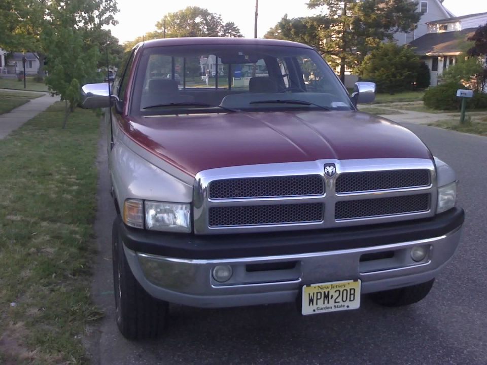 1996 Dodge 1500 pickup truck, front view, red and silver