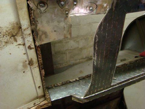 1948 Jeep Wrangler - Vehicle body repair work in progress, focusing on metal fabrication and rust damage.