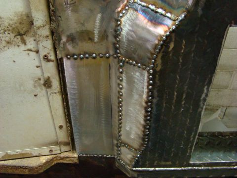 1948 Jeep Wrangler - Newly welded metal body panels with many spot welds visible.