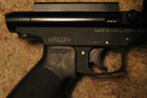 1994 Ford Bronco - This close-up shows the receiver of an air gun, the PMI logo and manufacturing details.