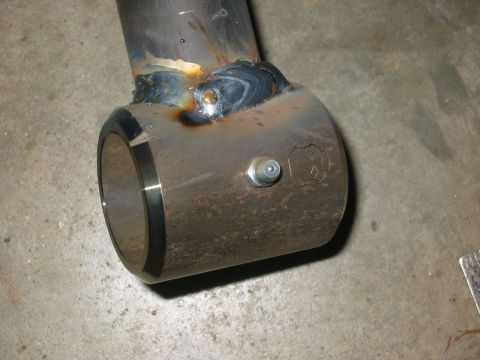 1995 Ford Bronco - Metal tube assembly with visible welds and a grease zerk fitting.
