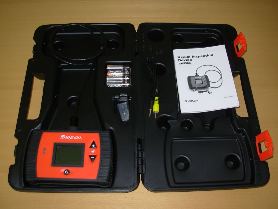Brand new - never used.  This is the upgraded version WITHOUT the battery-drain issue.

The entire box as shown weighs 4 lbs.  The unit w/batteries weighs 1.4 lbs.  The probe is over 36" long, and the tip is 5/16" (8mm) diameter.  The probe will remain coiled in a 4" circle (2" radius bend).  The body is less than 6x4x2" and the viewable screen is 1 7/8 x 1 3/8" (over 2.25" diag.).