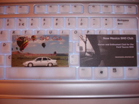 1990 Ford Taurus - Business cards for the New Mexico SHO Club are displayed on a laptop keyboard.