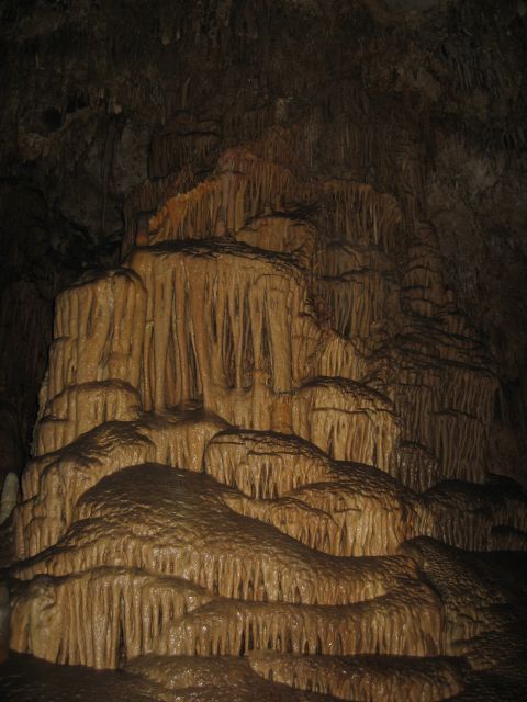 2006 Ford E350 - A detailed view of natural cave formations, intricate stalactite and stalagmite structures.