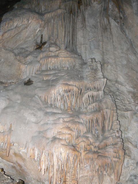 2006 Ford E350 - Interior view of a cave showing extensive stalactite and stalagmite formations.