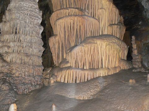 2006 Ford E350 - A natural cave interior displays impressive stalactite and stalagmite formations, geological artistry.