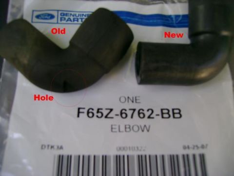 2007 Ford Mustang - Comparison of an old Ford elbow part with a hole and a new one.