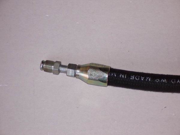 High pressure hose steering box end