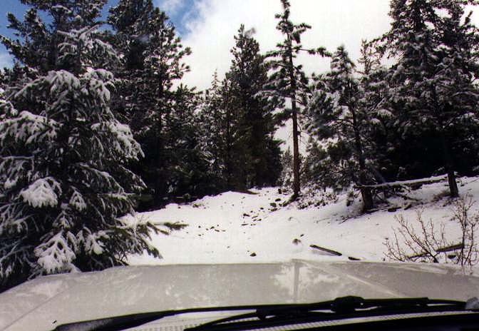 This is the photo taken when I was contemplating whether to try the trail or not.  It's difficult to tell, but there are two man-made mounds designed to keep 4x4s off of it. Nothing but a better reason to try, I say.