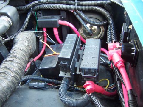 1983 Ford Bronco - 3G alternator connection on the radiator support member. Left to right Switched 12V distribution block, Fan Control, Relay box, Fuse box, s…