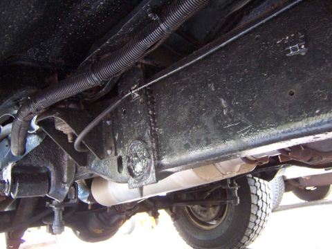 1983 Ford Bronco - Ran along the outside of the frame and close to the floor boards to protect it from exhaust heat and ground obstacles