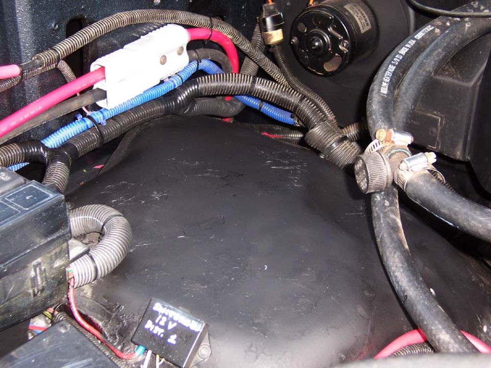 In engine compartment I used a set of battery cable connectors as a local means to disconnect the battery.