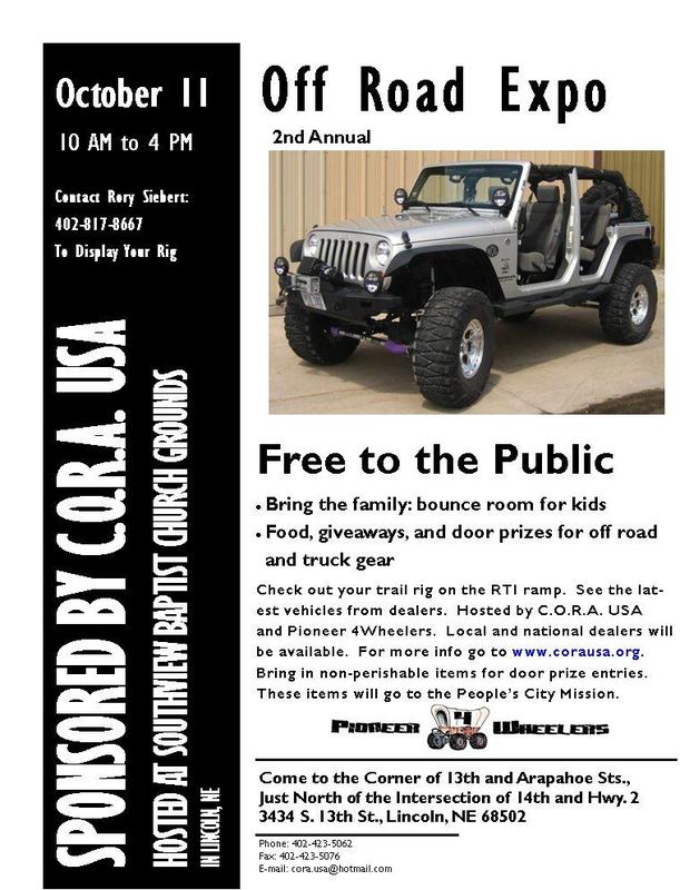 Silver Jeep Wrangler with large tires, lifted suspension, and open doors