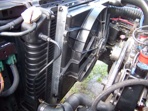 1983 Ford Bronco - Fabricated a bracket out of 3/4 inch aluminum L stock. Used 8 1/2 inch bolts and washers to mount the L bracket to the fan shroud. The L br…