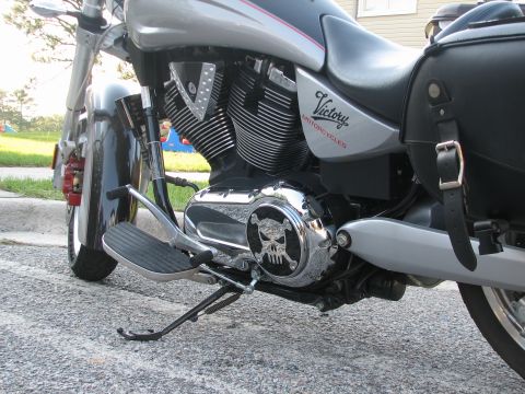 2006 Victory Kingpin - Close-up view of a motorcycle's engine and saddlebag, showing custom details.
