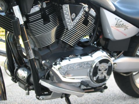 2006 Victory Kingpin - Close-up of a Victory motorcycle engine, a chrome skull emblem on the side cover.