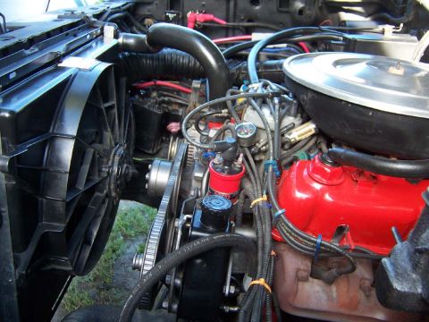 1983 Ford Bronco - Replaced transmission cooling lines, fan mounting, Saginaw Power Steering pump V-belt installation