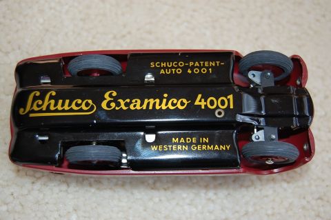 1968 Chrysler Town & Country - Underside view of a red Schuco Examico 4001 toy car, made in Western Germany.
